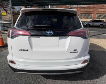 Белый Тойота РАВ 4, объемом двигателя 2.5 л и пробегом 64 тыс. км за 11000 $, фото 4 на Automoto.ua