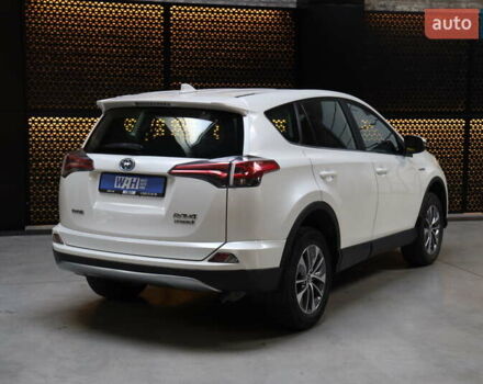 Білий Тойота РАВ 4, об'ємом двигуна 2.49 л та пробігом 72 тис. км за 24000 $, фото 5 на Automoto.ua