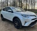 Белый Тойота РАВ 4, объемом двигателя 2.5 л и пробегом 124 тыс. км за 12200 $, фото 1 на Automoto.ua