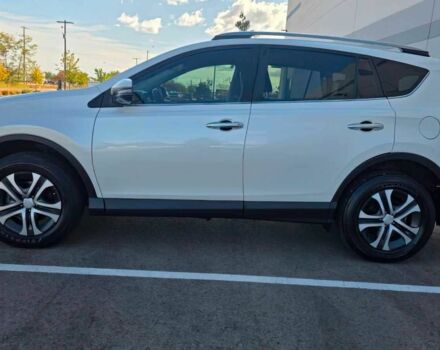 Белый Тойота РАВ 4, объемом двигателя 2.5 л и пробегом 64 тыс. км за 4500 $, фото 3 на Automoto.ua