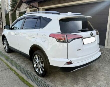 Белый Тойота РАВ 4, объемом двигателя 2.5 л и пробегом 80 тыс. км за 16000 $, фото 4 на Automoto.ua