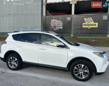 Белый Тойота РАВ 4, объемом двигателя 2.49 л и пробегом 154 тыс. км за 19400 $, фото 1 на Automoto.ua