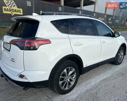 Белый Тойота РАВ 4, объемом двигателя 2.49 л и пробегом 154 тыс. км за 19400 $, фото 4 на Automoto.ua