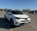 Белый Тойота РАВ 4, объемом двигателя 2.5 л и пробегом 124 тыс. км за 19999 $, фото 1 на Automoto.ua