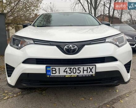 Белый Тойота РАВ 4, объемом двигателя 2.49 л и пробегом 107 тыс. км за 16950 $, фото 2 на Automoto.ua