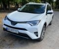 Белый Тойота РАВ 4, объемом двигателя 2.5 л и пробегом 80 тыс. км за 25000 $, фото 1 на Automoto.ua