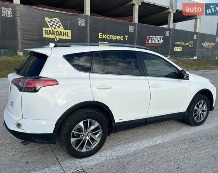 Белый Тойота РАВ 4, объемом двигателя 2.49 л и пробегом 154 тыс. км за 19400 $, фото 3 на Automoto.ua