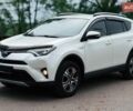 Белый Тойота РАВ 4, объемом двигателя 2.49 л и пробегом 150 тыс. км за 18000 $, фото 1 на Automoto.ua