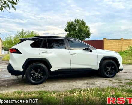 Білий Тойота РАВ 4, об'ємом двигуна 2 л та пробігом 92 тис. км за 29700 $, фото 3 на Automoto.ua