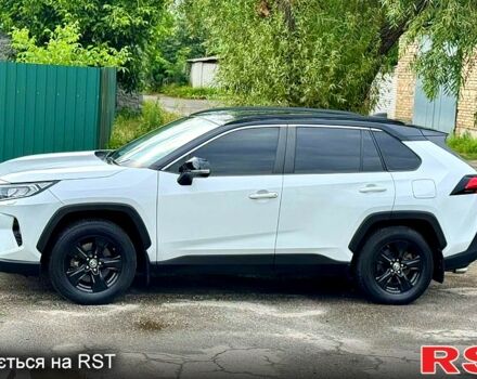 Білий Тойота РАВ 4, об'ємом двигуна 2 л та пробігом 92 тис. км за 29700 $, фото 2 на Automoto.ua
