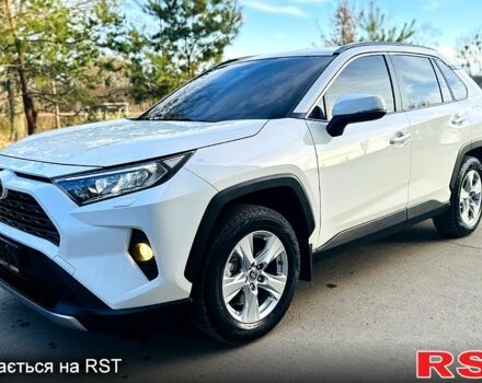 Белый Тойота РАВ 4, объемом двигателя 2 л и пробегом 155 тыс. км за 25550 $, фото 1 на Automoto.ua