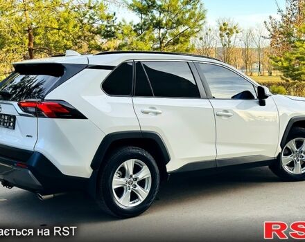 Белый Тойота РАВ 4, объемом двигателя 2 л и пробегом 155 тыс. км за 25550 $, фото 4 на Automoto.ua