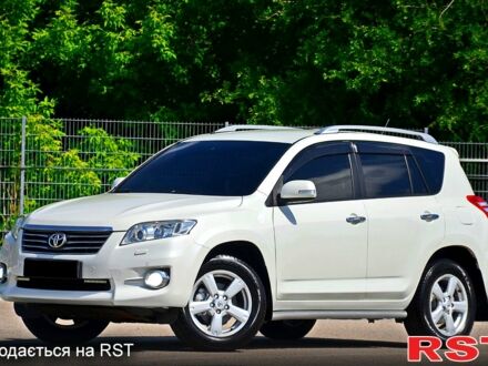 Білий Тойота РАВ 4, об'ємом двигуна 2 л та пробігом 125 тис. км за 14200 $, фото 1 на Automoto.ua