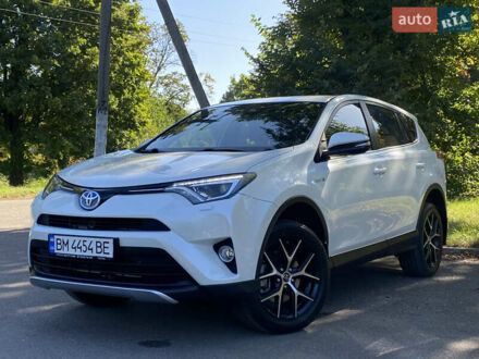 Тойота РАВ 4 2016 в Ромнах на Automoto.ua Белый Тойота РАВ 4, объемом двигателя 2.49 л и пробегом 135 тыс. км за 23555 $, фото 1 на Automoto.ua