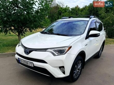 Белый Тойота РАВ 4, объемом двигателя 2.49 л и пробегом 104 тыс. км за 21000 $, фото 1 на Automoto.ua