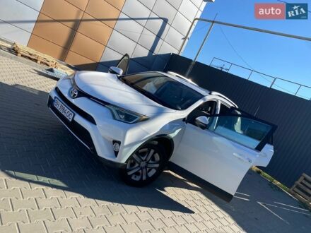 Белый Тойота РАВ 4, объемом двигателя 2.49 л и пробегом 250 тыс. км за 13600 $, фото 1 на Automoto.ua