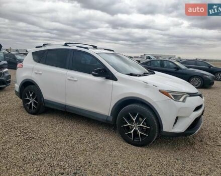 Белый Тойота РАВ 4, объемом двигателя 2.49 л и пробегом 175 тыс. км за 5300 $, фото 1 на Automoto.ua