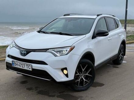 Білий Тойота РАВ 4, об'ємом двигуна 2.49 л та пробігом 90 тис. км за 25000 $, фото 1 на Automoto.ua