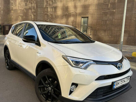 Белый Тойота РАВ 4, объемом двигателя 2.49 л и пробегом 100 тыс. км за 25999 $, фото 1 на Automoto.ua