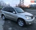 Бежевый Тойота РАВ 4, объемом двигателя 2 л и пробегом 320 тыс. км за 8500 $, фото 1 на Automoto.ua