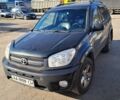 Черный Тойота РАВ 4, объемом двигателя 2 л и пробегом 319 тыс. км за 5700 $, фото 1 на Automoto.ua