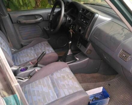 Чорний Тойота РАВ 4, об'ємом двигуна 2 л та пробігом 159 тис. км за 1850 $, фото 6 на Automoto.ua