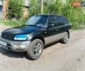 Черный Тойота РАВ 4, объемом двигателя 2 л и пробегом 437 тыс. км за 3500 $, фото 2 на Automoto.ua