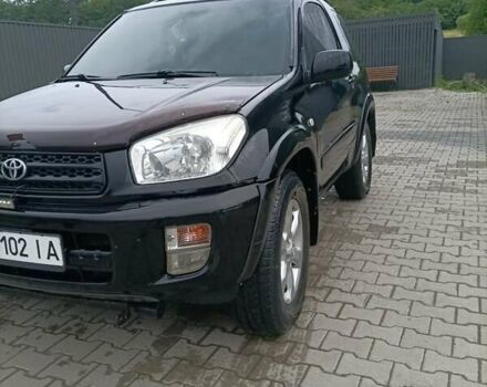 Чорний Тойота РАВ 4, об'ємом двигуна 2 л та пробігом 203 тис. км за 5650 $, фото 1 на Automoto.ua