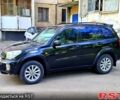 Черный Тойота РАВ 4, объемом двигателя 2 л и пробегом 300 тыс. км за 5700 $, фото 1 на Automoto.ua