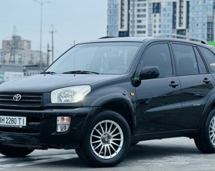 Черный Тойота РАВ 4, объемом двигателя 2 л и пробегом 205 тыс. км за 5900 $, фото 2 на Automoto.ua