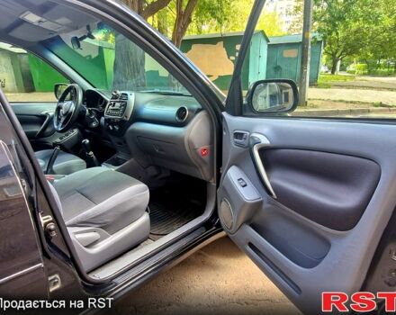 Черный Тойота РАВ 4, объемом двигателя 2 л и пробегом 300 тыс. км за 5700 $, фото 8 на Automoto.ua