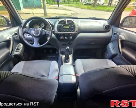 Черный Тойота РАВ 4, объемом двигателя 2 л и пробегом 300 тыс. км за 5700 $, фото 11 на Automoto.ua