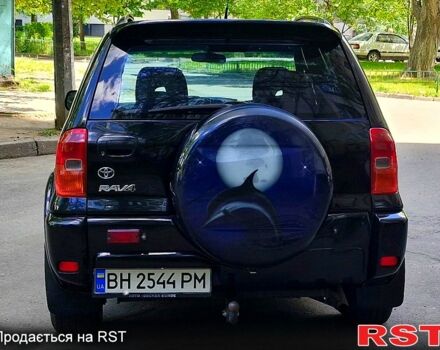 Черный Тойота РАВ 4, объемом двигателя 2 л и пробегом 300 тыс. км за 5700 $, фото 3 на Automoto.ua