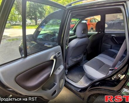 Черный Тойота РАВ 4, объемом двигателя 2 л и пробегом 300 тыс. км за 5700 $, фото 9 на Automoto.ua