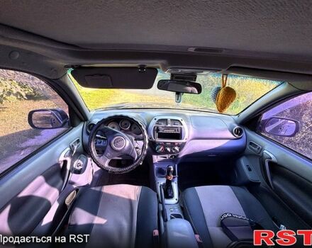 Черный Тойота РАВ 4, объемом двигателя 2 л и пробегом 493 тыс. км за 4999 $, фото 3 на Automoto.ua