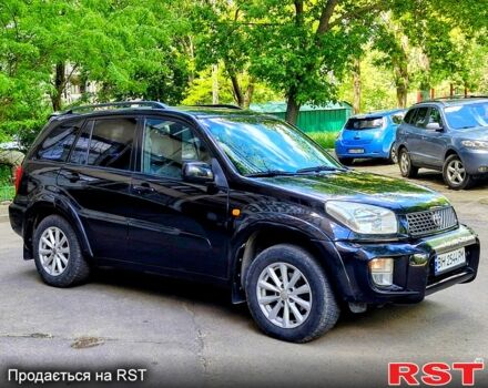 Черный Тойота РАВ 4, объемом двигателя 2 л и пробегом 300 тыс. км за 5700 $, фото 5 на Automoto.ua