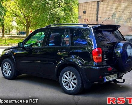 Черный Тойота РАВ 4, объемом двигателя 2 л и пробегом 300 тыс. км за 5700 $, фото 2 на Automoto.ua