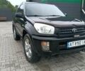 Чорний Тойота РАВ 4, об'ємом двигуна 2 л та пробігом 203 тис. км за 5650 $, фото 3 на Automoto.ua