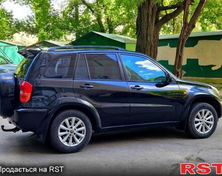 Черный Тойота РАВ 4, объемом двигателя 2 л и пробегом 300 тыс. км за 5700 $, фото 4 на Automoto.ua