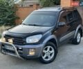 Черный Тойота РАВ 4, объемом двигателя 2 л и пробегом 248 тыс. км за 6800 $, фото 1 на Automoto.ua