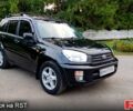 Чорний Тойота РАВ 4, об'ємом двигуна 2 л та пробігом 240 тис. км за 6299 $, фото 1 на Automoto.ua