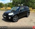 Черный Тойота РАВ 4, объемом двигателя 2 л и пробегом 250 тыс. км за 4650 $, фото 1 на Automoto.ua
