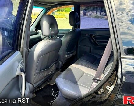 Черный Тойота РАВ 4, объемом двигателя 2 л и пробегом 250 тыс. км за 4650 $, фото 6 на Automoto.ua