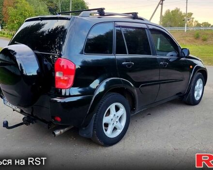 Чорний Тойота РАВ 4, об'ємом двигуна 2 л та пробігом 240 тис. км за 6299 $, фото 3 на Automoto.ua