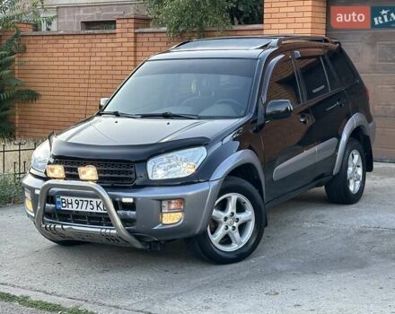 Черный Тойота РАВ 4, объемом двигателя 2 л и пробегом 248 тыс. км за 6800 $, фото 4 на Automoto.ua
