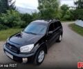 Чорний Тойота РАВ 4, об'ємом двигуна 2 л та пробігом 240 тис. км за 6299 $, фото 4 на Automoto.ua