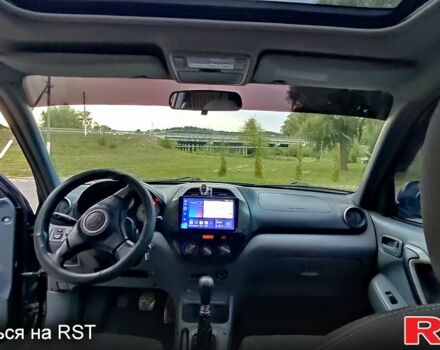 Чорний Тойота РАВ 4, об'ємом двигуна 2 л та пробігом 240 тис. км за 6299 $, фото 7 на Automoto.ua