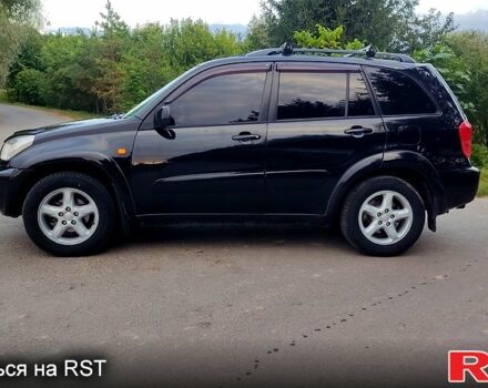 Чорний Тойота РАВ 4, об'ємом двигуна 2 л та пробігом 240 тис. км за 6299 $, фото 1 на Automoto.ua