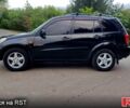 Чорний Тойота РАВ 4, об'ємом двигуна 2 л та пробігом 240 тис. км за 6299 $, фото 1 на Automoto.ua