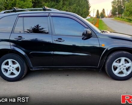 Чорний Тойота РАВ 4, об'ємом двигуна 2 л та пробігом 240 тис. км за 6299 $, фото 2 на Automoto.ua